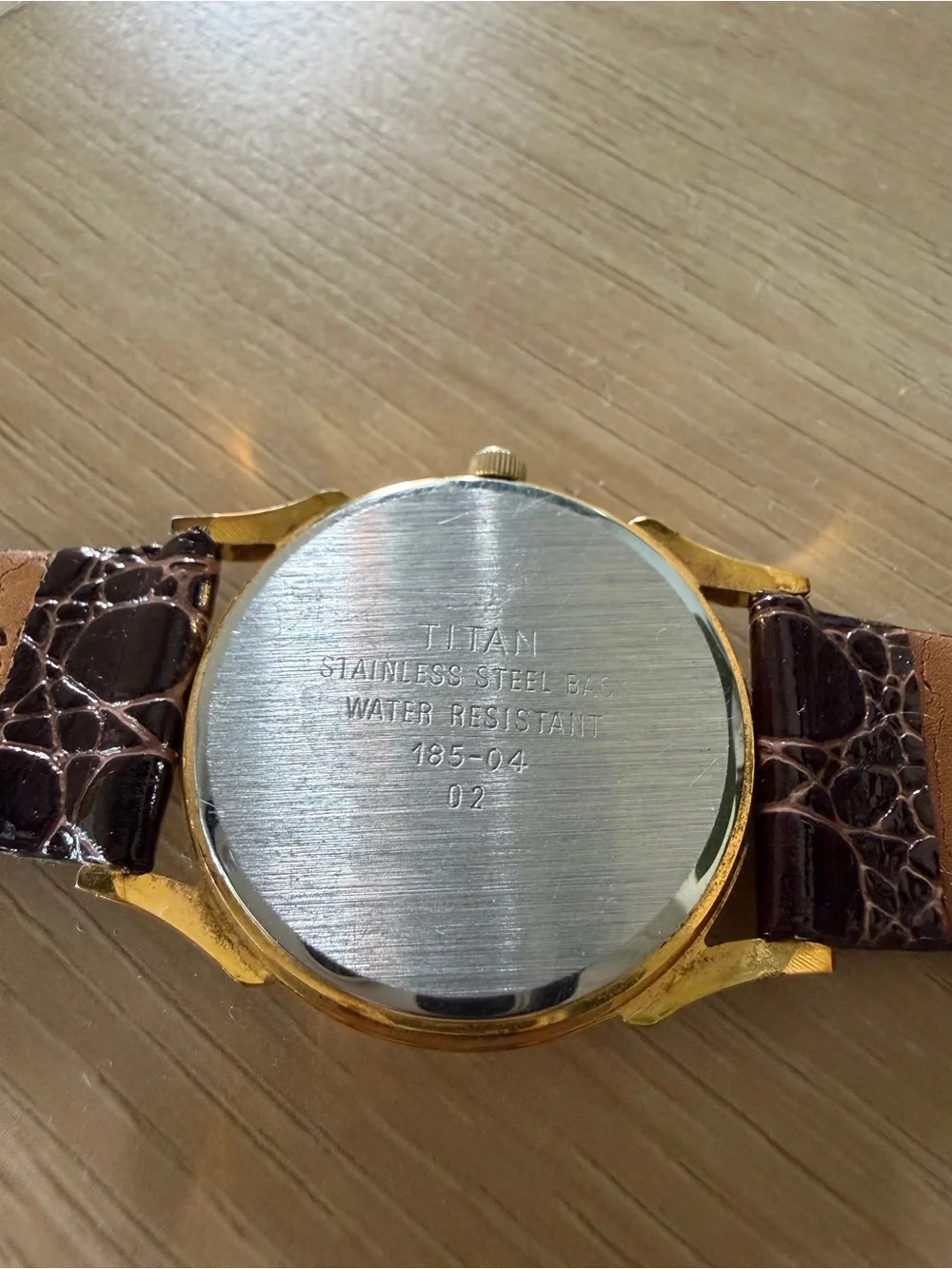 Titan Watch — Gold Case with Dark Brownish Croc-Pattern Leather Strap